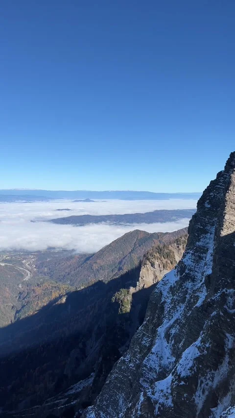 Dramatic Mountain View Above Clouds in Slovenia — Dovska Baba Peak Stock Footage 335224564