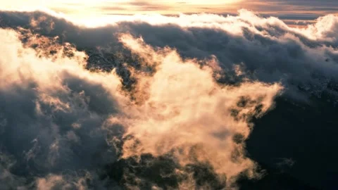 Dramatic movement of clouds over the mountains in winter.Light illuminates the Stock-Footage 230719559