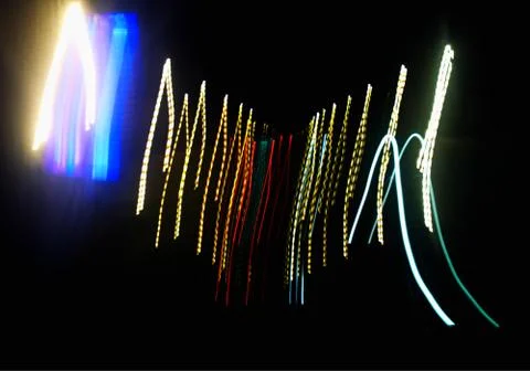 Dramatic neon light traces background Stock Photos