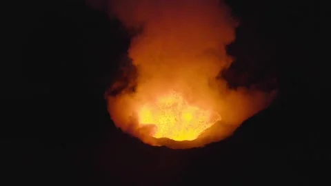 Dramatic Night Aerial View of Glowing Active Volcano Crater Eruption Stock Footage 322159440