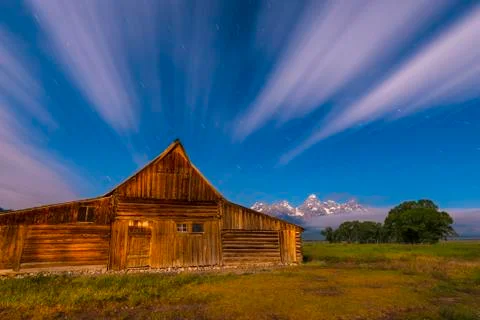 Dramatic night sky at mormon row with view at grand teton Stock Photos