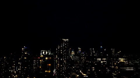 A dramatic night skyline of Toronto flashes under a powerful lightning storm.  Stock Footage 347680241