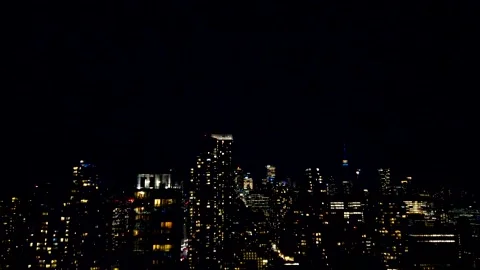 A dramatic night skyline of Toronto flashes under a powerful lightning storm.  스톡 동영상 347680286