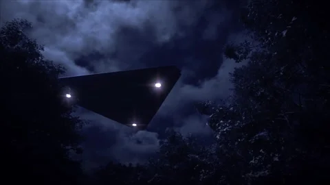 Dramatic night view, up through the canopy in a forest as a huge black triangle Vídeos de archivo 311085933