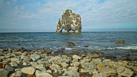 Dramatic ocean cliff in north Iceland with Hvítserkur rock formation. Stock Footage 293637876
