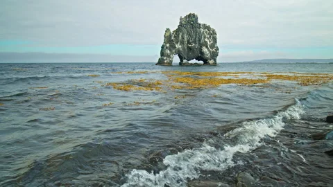 Dramatic ocean cliff in north Iceland with Hvítserkur rock formation. Stock Footage 293637909