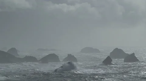 DRAMATIC OCEAN SCENE WITH ROCK OUTCROPPING Video stock 59069946