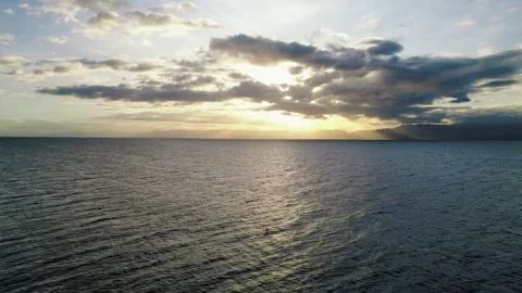 Dramatic Ocean Sunset with Rays Breaking Through Clouds 動画素材 313456069
