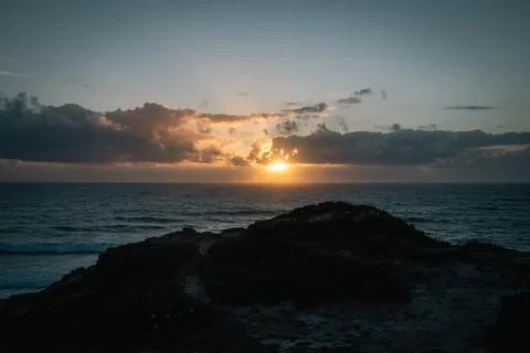 Dramatic Ocean Sunset From Silhouetted Cliff - Portuguese Coast Stock Photos
