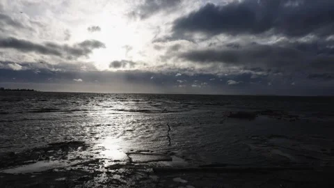 Dramatic Ocean Sunset with Sun Rays Through Clouds Stock Footage 271200858