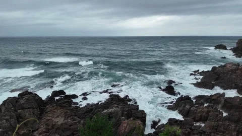 Dramatic ocean wave hit dark rock on the coast outdoor Video stock 342482197