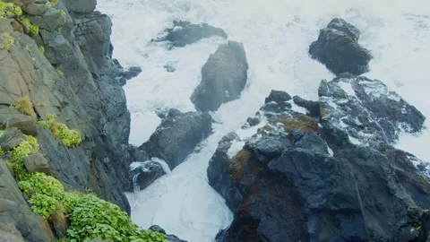 Dramatic Ocean Waves Crashing on Rugged Coastal Cliffs Stock Footage 320202476