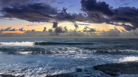 Dramatic Ocean Waves Sunset View with Dark Clouds Stock Footage 320095629