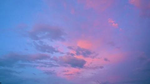 Dramatic Orange and Blue Sunset Sky Time-Lapse with Glowing Cumulonimbus Cl.. Stock Footage 339936399