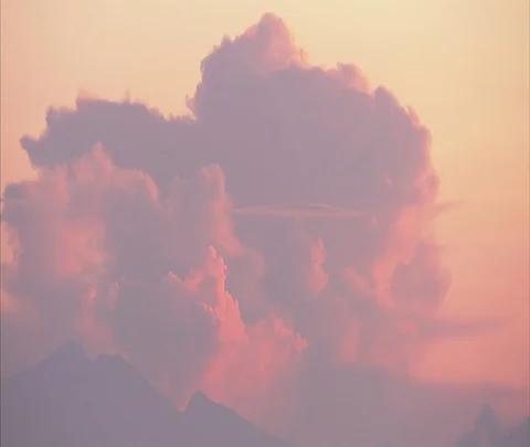 Dramatic orange and purple clouds in hazy sky Stock Footage 86747659