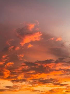 Dramatic Orange Clouds at Sunset Stock Photos