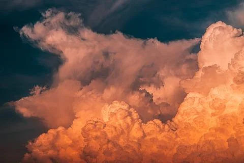 Dramatic orange sunset clouds and stormy sky Stock Photos