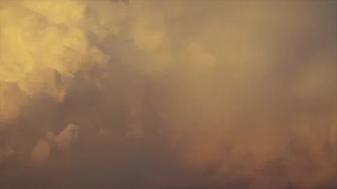 Dramatic orange sunset clouds moving across darkening evening sky. Stock Footage 337613961