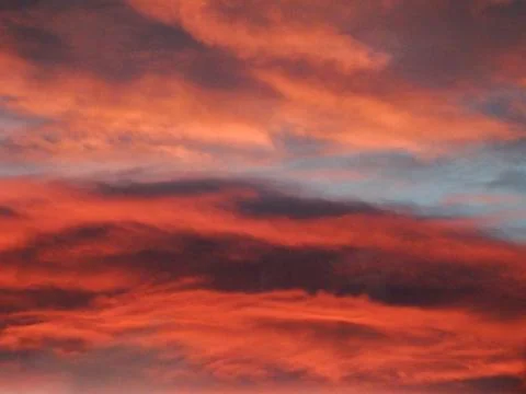 Dramatic Orange Sunset Clouds Stock Photos