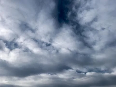 Dramatic overcast sky with dark clouds, moody weather background, atmospher.. Stock Photos