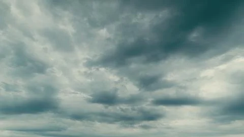 A Dramatic Overcast Sky Exhibiting Intricate Cloud Patterns and Unique Atmospher 写真素材