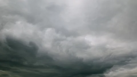 A Dramatic Overcast Sky Filled with Dark Clouds Making a Striking Visual Stateme Stock Footage 312722824