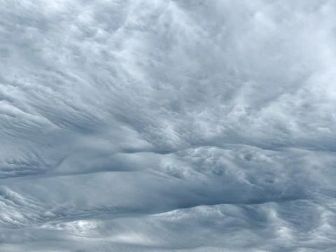 Dramatic overcast sky filled with textured clouds Foto stock