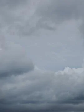 Dramatic Overcast Sky with Heavy Grey Storm Clouds Stock Photos