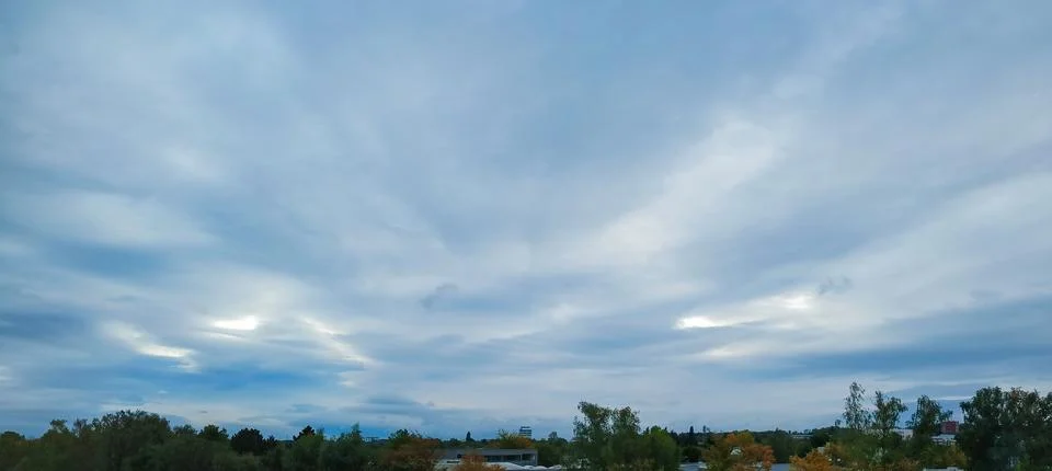 Dramatic Overcast Sky with Layered Clouds Above Horizon Stock Photos
