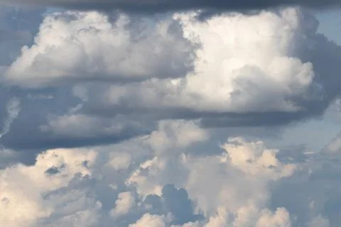 Dramatic Overcast Sky With Layered Cumulus Clouds, Sunlit Patches And Blue .. Stock Photos