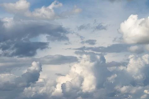 Dramatic Overcast Sky With Layered Cumulus Clouds, Sunlit Patches And Blue .. Stock Photos
