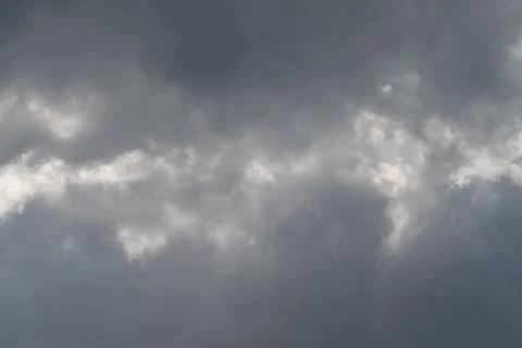 Dramatic overcast sky with layered storm clouds Stock Photos