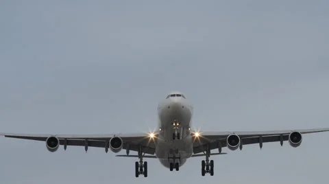 DRAMATIC OVERHEAD SHOT OF JET LANDING Video stock 63319885