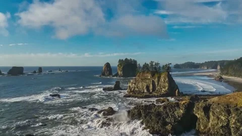 Dramatic pacific coastline with rugged rocks and crashing waves. Drone view. Stock Footage 295912730