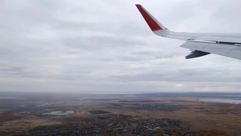 Dramatic panorama of the atmosphere of gray clouds from the airplane window. Stock Footage 166209434