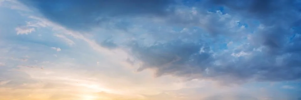 Dramatic panorama sky with cloud on sunrise and sunset time. Stock Photos
