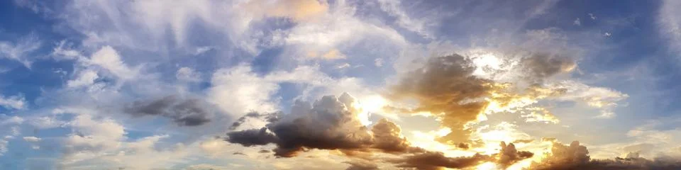 Dramatic panorama sky with cloud on sunrise and sunset time. Stock Photos