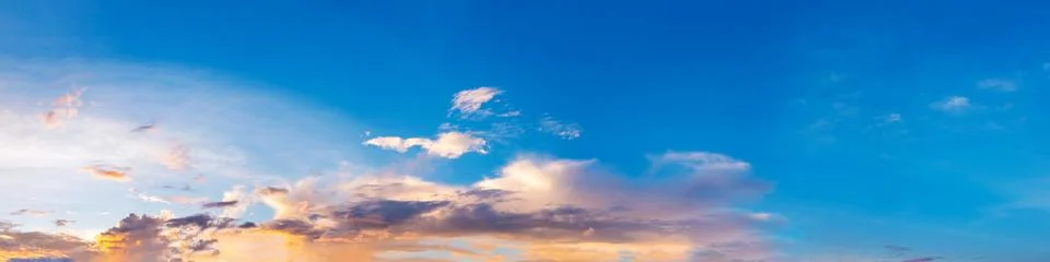 Dramatic panorama sky with cloud on sunrise and sunset time. Stock Photos