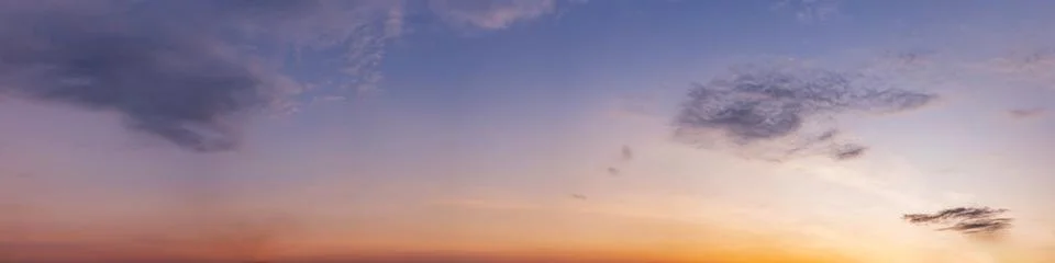Dramatic panorama sky with cloud on sunrise and sunset time. Stock Photos