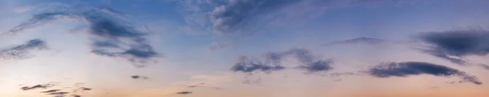 Dramatic panorama sky with cloud on sunrise and sunset time. Stock Photos
