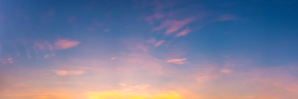 Dramatic panorama sky with cloud on sunrise and sunset time. Stock Photos
