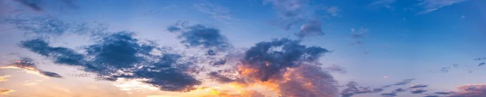 Dramatic panorama sky with cloud on sunrise and sunset time. Stock Photos