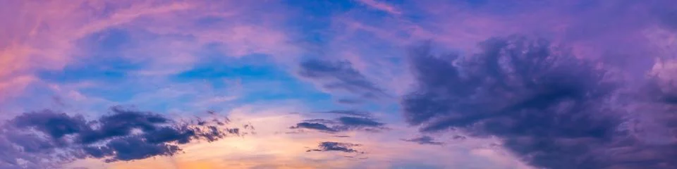 Dramatic panorama sky with cloud on sunrise and sunset time. Stock Photos