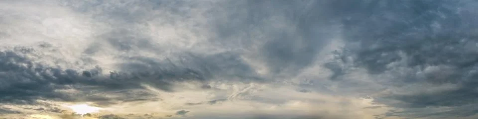 Dramatic panorama sky with storm cloud on a cloudy day. Stock Photos