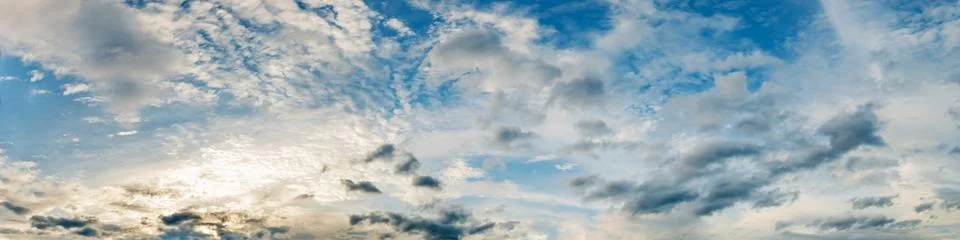 Dramatic panorama sky with storm cloud on a cloudy day. Stock Photos