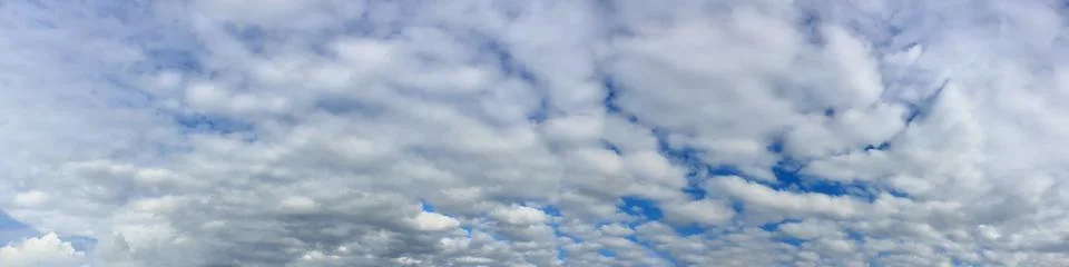 Dramatic panorama sky with storm cloud on a cloudy day. Stock Photos