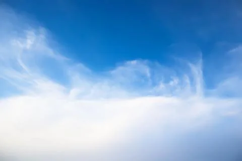 Dramatic panorama view of buautiful soft white clouds and morning blue sky. Stock Photos