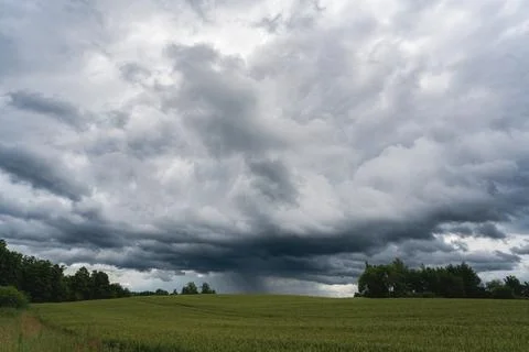 A dramatic panoramic view of massive storm clouds building 写真素材