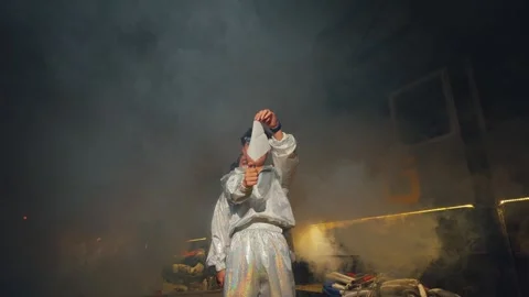 Dramatic Performance in Shiny Outfit Stock Footage 303524535