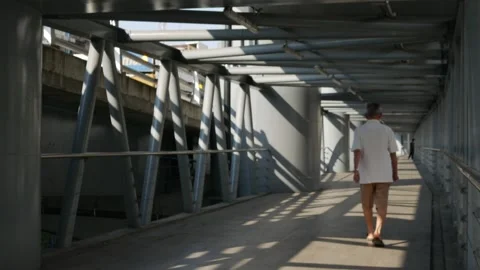 Dramatic perspective of an elevated walkway 库存影片 331494204